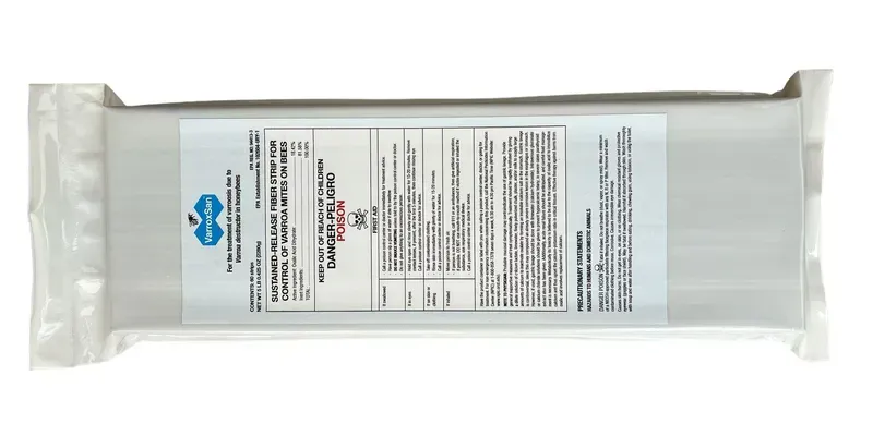 A plastic-wrapped white packet of VarroxSan miticide.